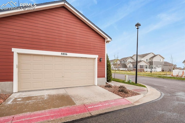 8806 Bella Flora Hts, Colorado Springs, CO 80924 - garage with a residential view