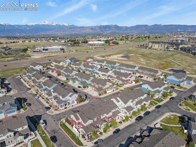 8806 Bella Flora Hts, Colorado Springs, CO 80924 - aerial view of property's location with mountains and nearby suburban area