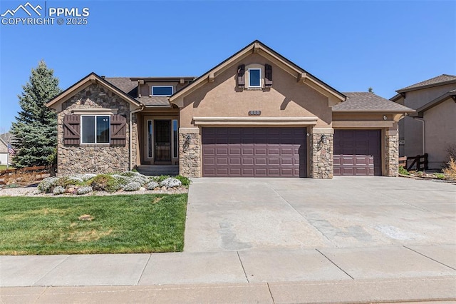 view of front facade with a garage, stucco siding, concrete driveway, stone siding, and a front lawn