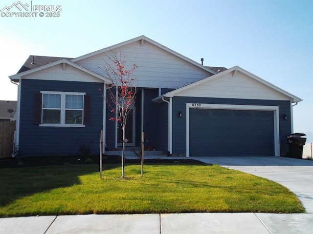 ranch-style house featuring concrete driveway, an attached garage, and a front lawn