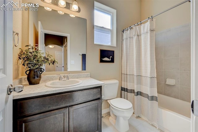 bathroom featuring vanity, tile patterned flooring, shower / bath combination with curtain, and toilet
