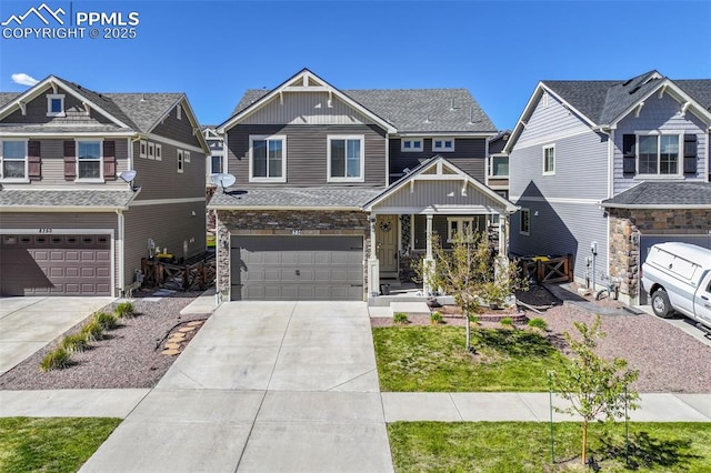 8356 Longleaf Ln, Colorado Springs, CO 80927 - craftsman-style house featuring covered porch, board and batten siding, a garage, and driveway