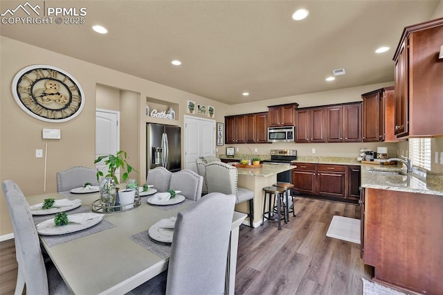 8356 Longleaf Ln, Colorado Springs, CO 80927 - dining room with visible vents, dark wood-style flooring, and recessed lighting