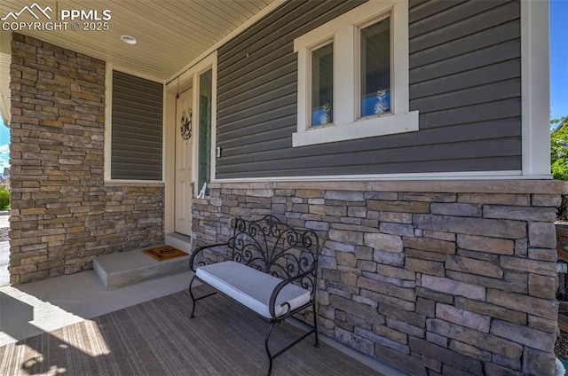8356 Longleaf Ln, Colorado Springs, CO 80927 - exterior space featuring a porch and stone siding