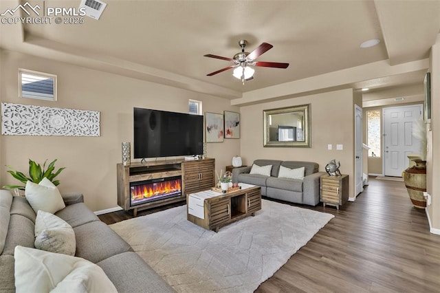 8356 Longleaf Ln, Colorado Springs, CO 80927 - living room with ceiling fan, baseboards, and plenty of natural light