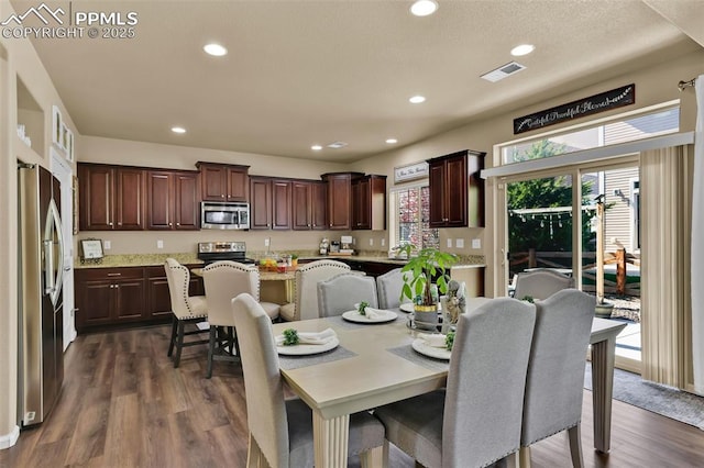 8356 Longleaf Ln, Colorado Springs, CO 80927 - dining area with dark wood-type flooring, visible vents, and recessed lighting