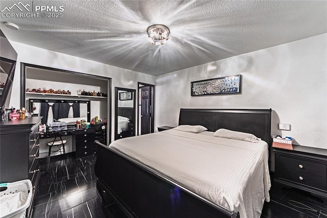 bedroom with a textured ceiling
