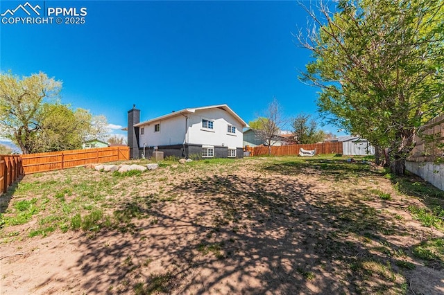 view of yard featuring a fenced backyard