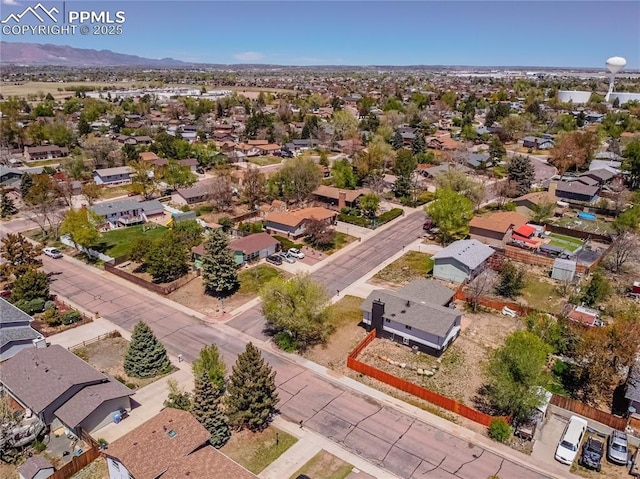 drone / aerial view with a mountain view and a residential view