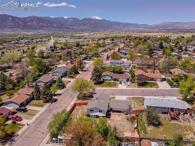 5160 Manzana Dr, Colorado Springs, CO 80911 - aerial perspective of suburban area with a mountain backdrop