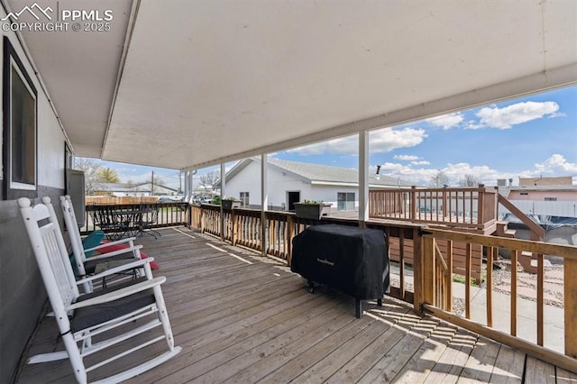 790 2nd Ave, Deer Trail, CO 80105 - wooden deck with a grill