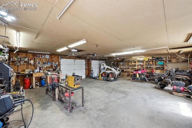 790 2nd Ave, Deer Trail, CO 80105 - garage featuring a workshop area