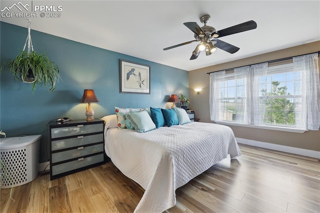 20420 Amanda Ct, Colorado Springs, CO 80908 - bedroom featuring wood finished floors, baseboards, and ceiling fan