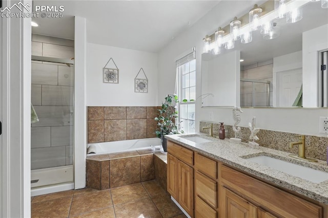 20420 Amanda Ct, Colorado Springs, CO 80908 - bathroom with double vanity, a shower stall, a bath, and tile patterned flooring