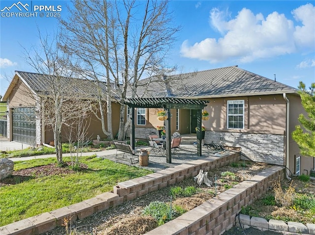 20420 Amanda Ct, Colorado Springs, CO 80908 - rear view of house with stone siding, stucco siding, a garage, a pergola, and a patio