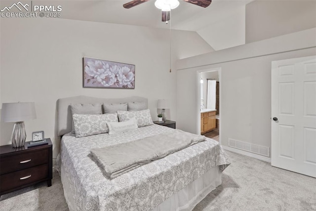 bedroom with ceiling fan, carpet, ensuite bathroom, lofted ceiling, and visible vents
