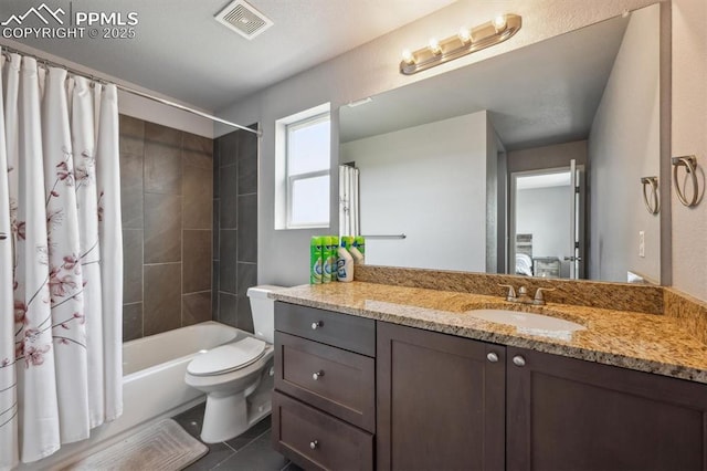 460 S 3rd Ave, Deer Trail, CO 80105 - bathroom with vanity, shower / bath combo with shower curtain, tile patterned flooring, and toilet