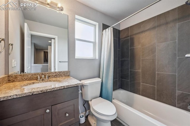 460 S 3rd Ave, Deer Trail, CO 80105 - bathroom featuring vanity, shower / tub combo with curtain, and toilet