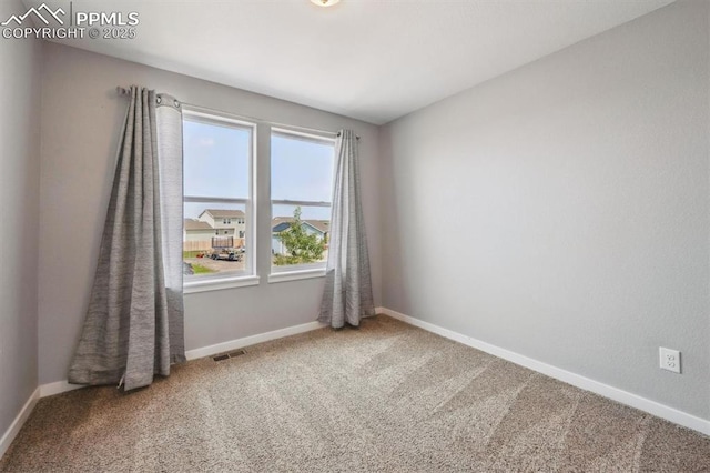 460 S 3rd Ave, Deer Trail, CO 80105 - carpeted empty room with baseboards