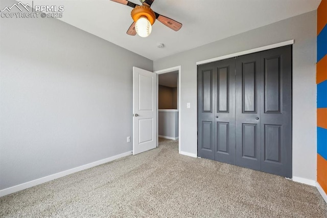 460 S 3rd Ave, Deer Trail, CO 80105 - unfurnished bedroom featuring carpet floors, baseboards, a closet, and a ceiling fan