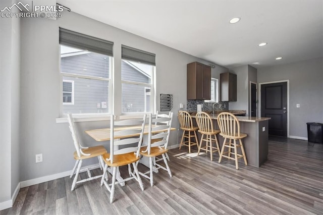 460 S 3rd Ave, Deer Trail, CO 80105 - dining room with baseboards, wood finished floors, and recessed lighting