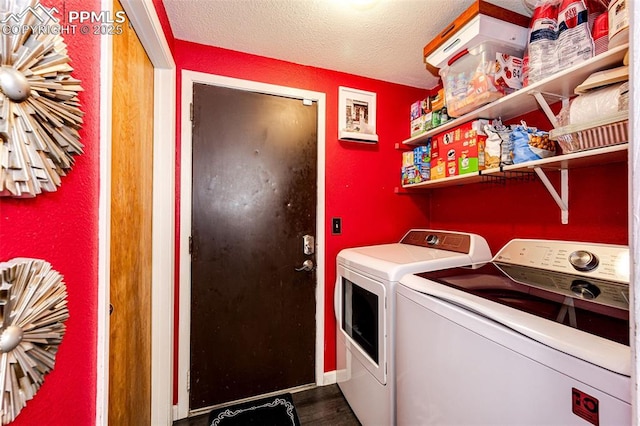 1085 6th St, Limon, CO 80828 - laundry room with independent washer and dryer, laundry area, a textured ceiling, dark wood finished floors, and baseboards