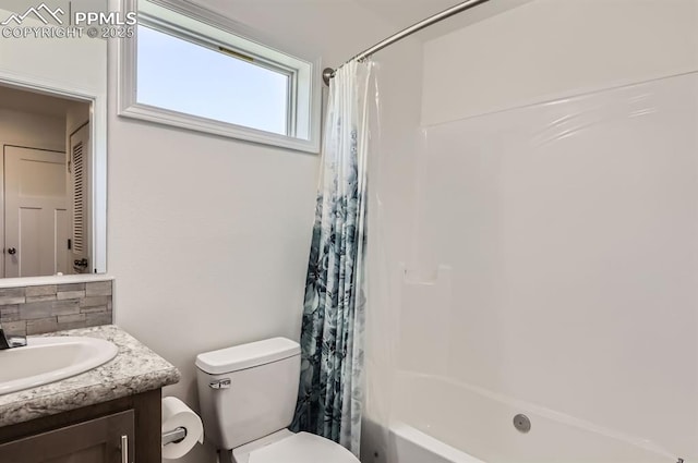 4157 Gray Fox Hts, Colorado Springs, CO 80922 - bathroom featuring vanity, shower / bath combo, backsplash, and toilet