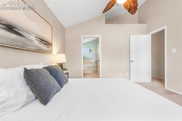 carpeted bedroom with vaulted ceiling, connected bathroom, ceiling fan, and baseboards