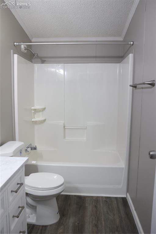 4663 Pine Marten Pt, Colorado Springs, CO 80922 - full bath featuring crown molding, a textured ceiling, wood finished floors, and toilet