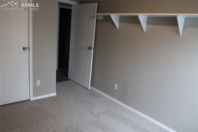 4663 Pine Marten Pt, Colorado Springs, CO 80922 - unfurnished bedroom featuring baseboards and carpet