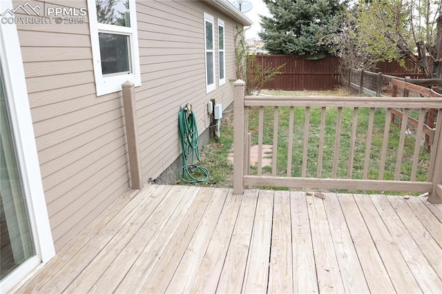 4663 Pine Marten Pt, Colorado Springs, CO 80922 - wooden terrace featuring a fenced backyard