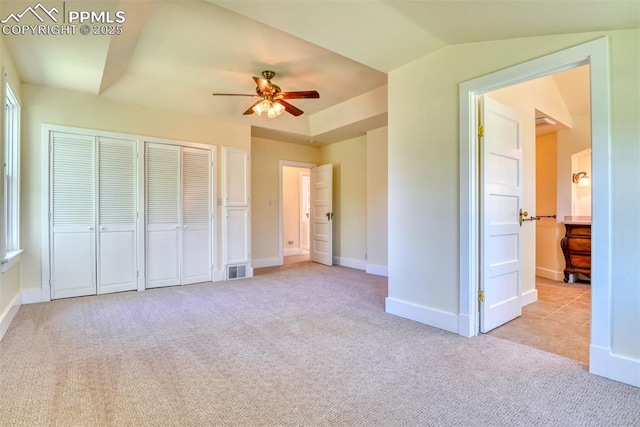unfurnished bedroom with a ceiling fan, a closet, carpet floors, visible vents, and baseboards