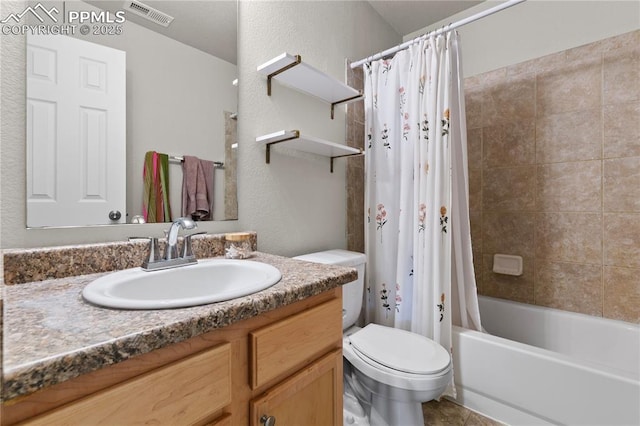 full bath with vanity, toilet, tile patterned floors, shower / bath combo with shower curtain, and visible vents