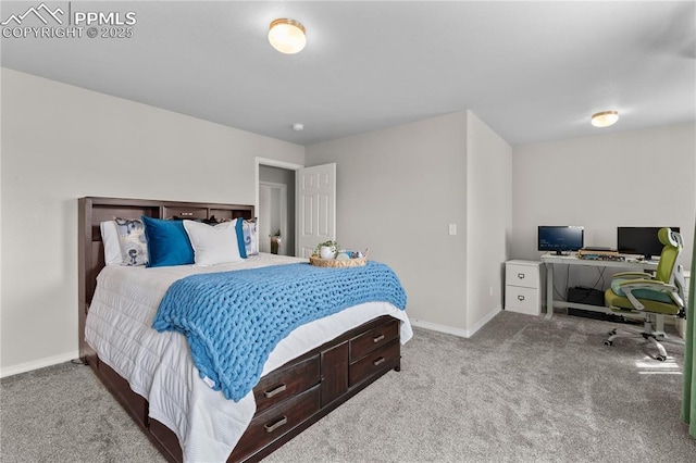 carpeted bedroom featuring baseboards