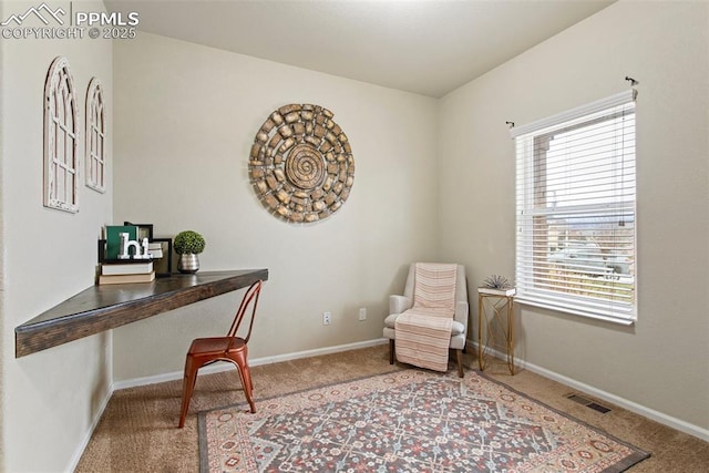 home office featuring baseboards, carpet, and visible vents