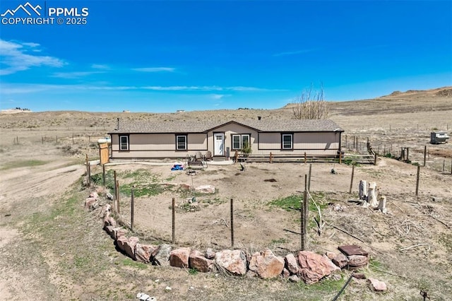 3235 S Meridian Rd, Colorado Springs, CO 80929 - back of property with fence and a mountain view
