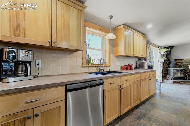 3235 S Meridian Rd, Colorado Springs, CO 80929 - kitchen featuring stainless steel dishwasher, a sink, light brown cabinetry, and a healthy amount of sunlight