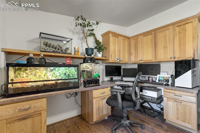 3235 S Meridian Rd, Colorado Springs, CO 80929 - home office with built in study area and dark wood finished floors