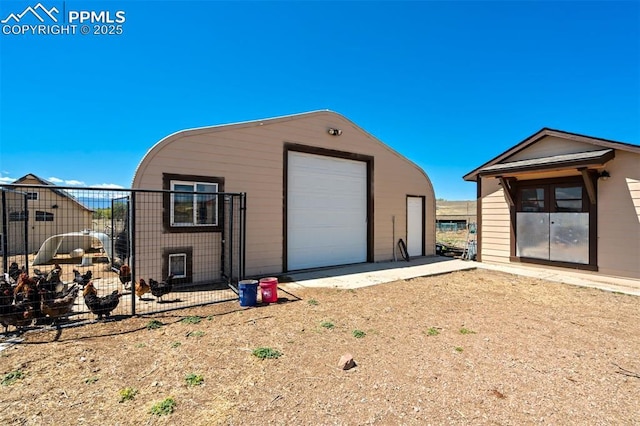 3235 S Meridian Rd, Colorado Springs, CO 80929 - detached garage with fence and driveway