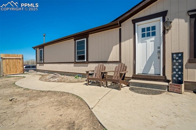 3235 S Meridian Rd, Colorado Springs, CO 80929 - back of property with entry steps and a patio area