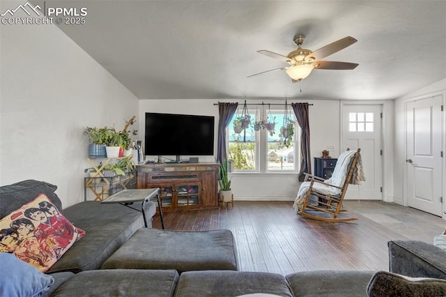 3235 S Meridian Rd, Colorado Springs, CO 80929 - living area featuring baseboards, a ceiling fan, and hardwood / wood-style floors