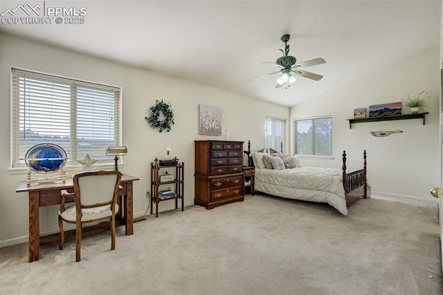 7850 Wilderness Dr, Colorado Springs, CO 80908 - bedroom featuring light carpet, vaulted ceiling, baseboards, and a desk