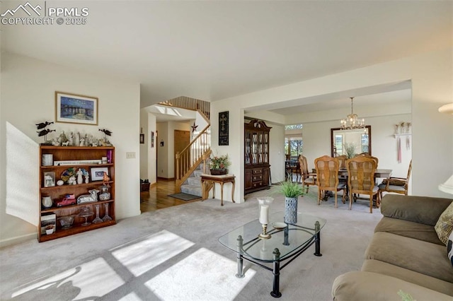 7850 Wilderness Dr, Colorado Springs, CO 80908 - living area featuring stairway, light colored carpet, and a chandelier