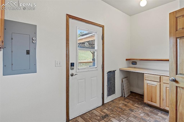 17880 Plains Edge Ct, Peyton, CO 80831 - entryway with brick floor and electric panel