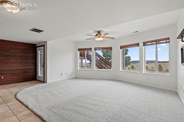 17880 Plains Edge Ct, Peyton, CO 80831 - spare room with visible vents, a ceiling fan, baseboards, and a healthy amount of sunlight