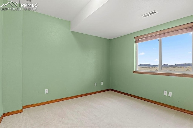 17880 Plains Edge Ct, Peyton, CO 80831 - unfurnished room with baseboards, visible vents, and light carpet