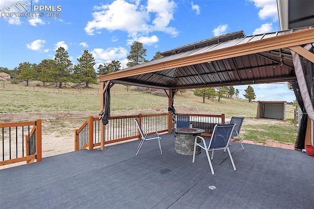 17880 Plains Edge Ct, Peyton, CO 80831 - view of patio with a gazebo and a fire pit