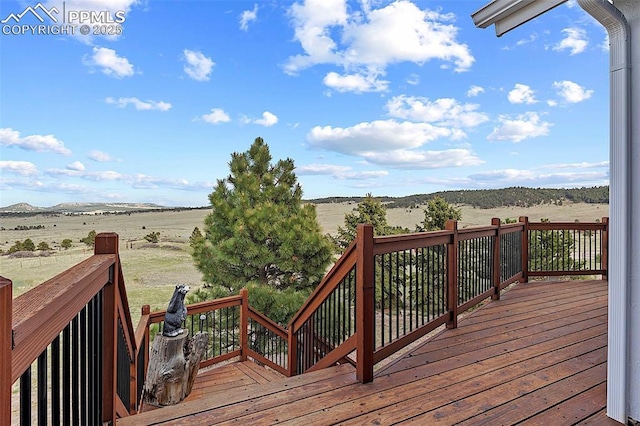 17880 Plains Edge Ct, Peyton, CO 80831 - wooden terrace featuring a mountain view