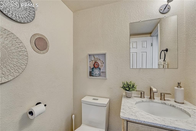 26 Mountain View Rd, Manitou Springs, CO 80829 - half bathroom featuring toilet and vanity