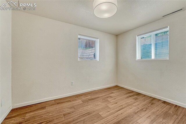26 Mountain View Rd, Manitou Springs, CO 80829 - unfurnished room with light wood finished floors and baseboards